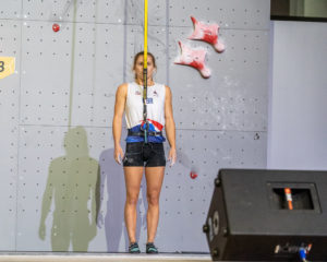 female speed climber preparing to start 2019 climbing world championships